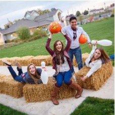 Students on haystacks